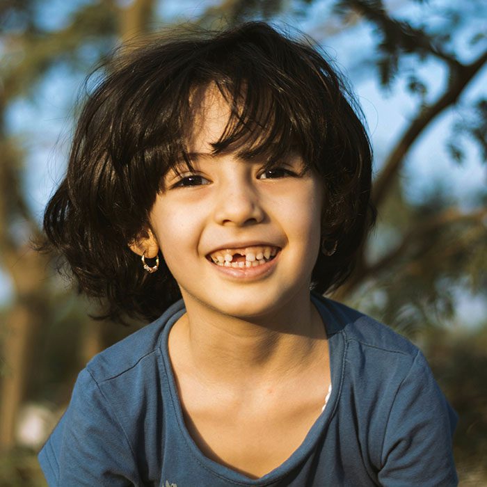 Make a Plan for the First Loose Tooth! - Z Dental Care - loose tooth plan 2023 700 - Z Dental Care -